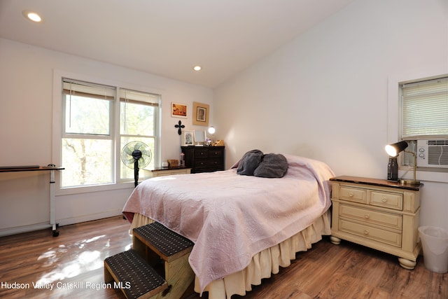 651 Glasco Tpke, Saugerties, NY 12477 - bedroom with lofted ceiling, dark wood-style flooring, cooling unit, and recessed lighting