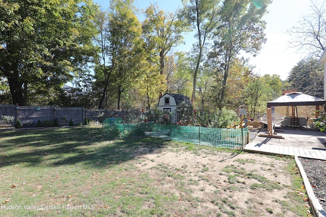 651 Glasco Tpke, Saugerties, NY 12477 - view of yard featuring a fenced backyard, an outbuilding, a deck, a gazebo, and a storage shed