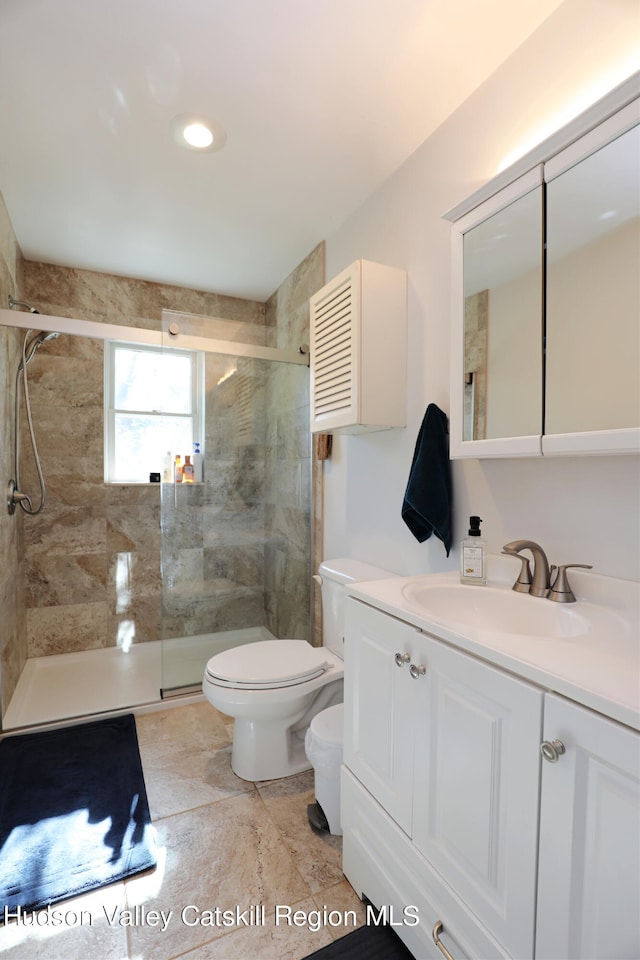 651 Glasco Tpke, Saugerties, NY 12477 - bathroom with vanity, toilet, and tiled shower