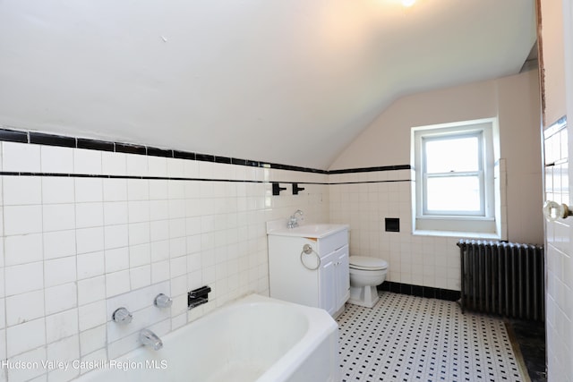 651 Glasco Tpke, Saugerties, NY 12477 - full bathroom featuring toilet, radiator, tile walls, a bath, and lofted ceiling