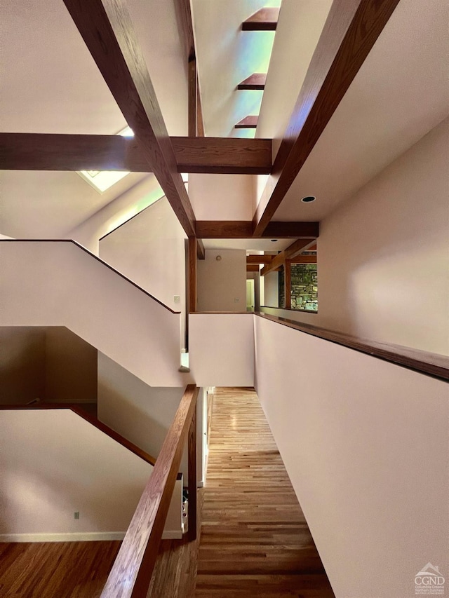 126 Shaker Ridge Dr, Canaan, NY 12029 - hallway featuring wood finished floors, beamed ceiling, and baseboards