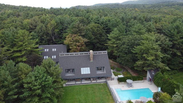 126 Shaker Ridge Dr, Canaan, NY 12029 - view of subject property featuring a heavily wooded area and a pool