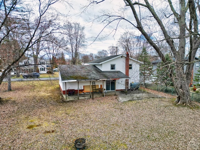 17 Bogardus Ave, Catskill, NY 12414 - rear view of property with a patio area, a chimney, and a shingled roof