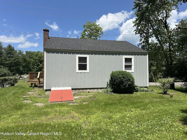 2206 County Route 7, Copake, NY 12516 - view of side of home with a shingled roof, a lawn, and a chimney