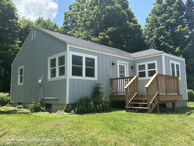 2206 County Route 7, Copake, NY 12516 - rear view of house with a shingled roof and a lawn