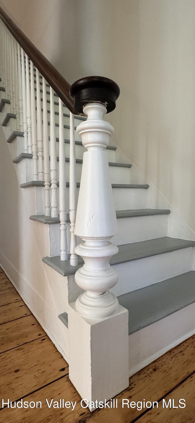 237 Main St, Copake, NY 12521 - staircase featuring wood finished floors and baseboards