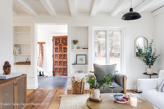 1637 Glasco Tpke, Woodstock, NY 12498 - living room with beam ceiling, built in features, and light wood-style floors