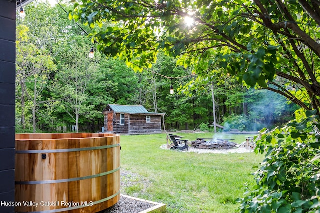 1637 Glasco Tpke, Woodstock, NY 12498 - view of yard featuring an outdoor fire pit and an outdoor structure