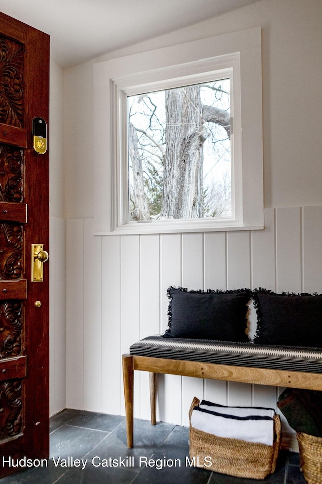 1637 Glasco Tpke, Woodstock, NY 12498 - living area featuring a decorative wall and wainscoting