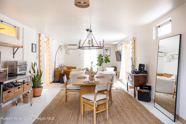 1637 Glasco Tpke, Woodstock, NY 12498 - dining space with a chandelier and a toaster