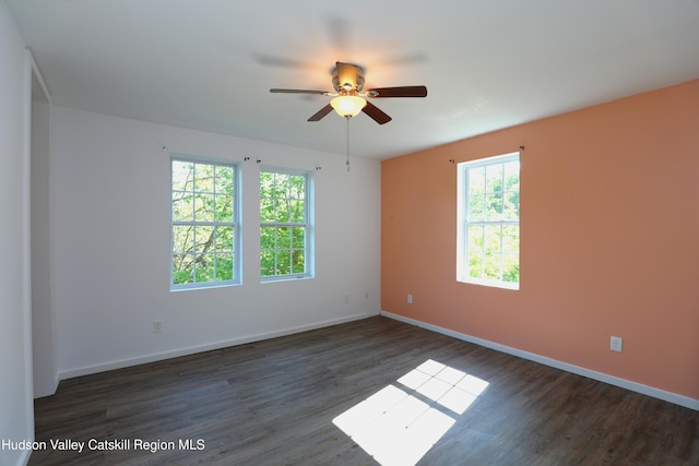 154 John St, East Kingston, NY 12401 - empty room with ceiling fan, dark wood finished floors, and baseboards