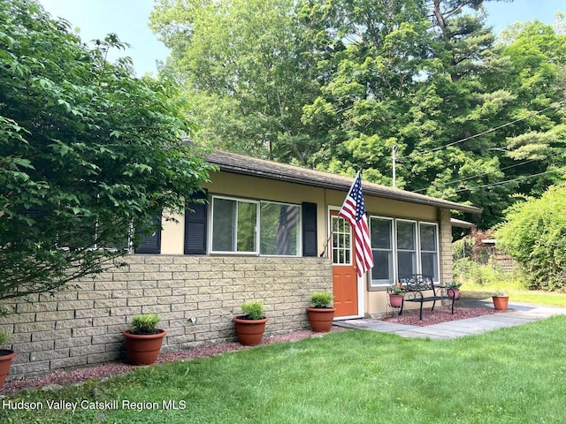 44 Overlook Dr, Woodstock, NY 12498 - view of front of property featuring a front yard and stone siding