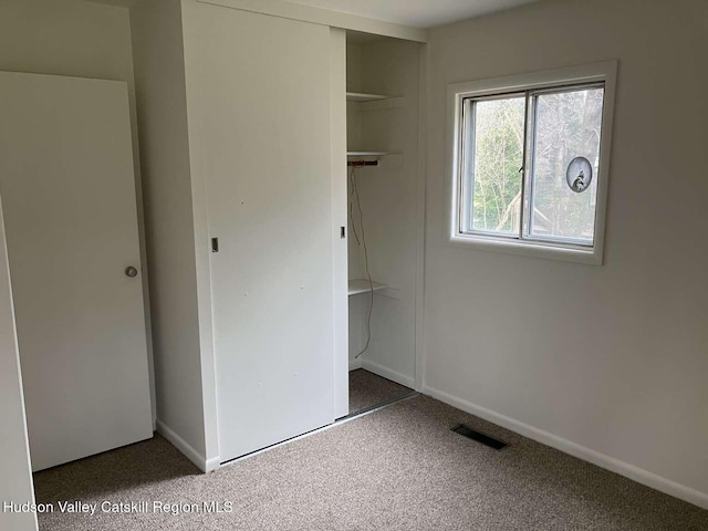 44 Overlook Dr, Woodstock, NY 12498 - unfurnished bedroom with a closet and carpet