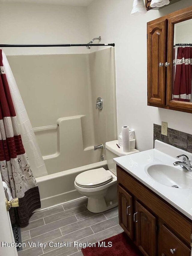 44 Overlook Dr, Woodstock, NY 12498 - bathroom with vanity, shower / bath combo with shower curtain, and wood finish floors