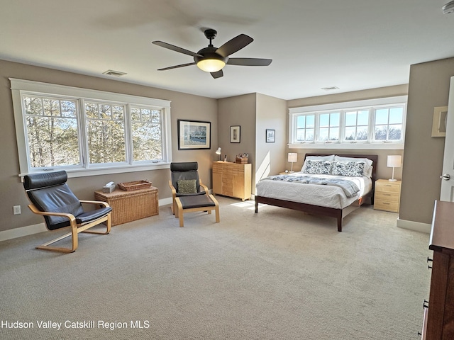 bedroom featuring baseboards, visible vents, and carpet flooring