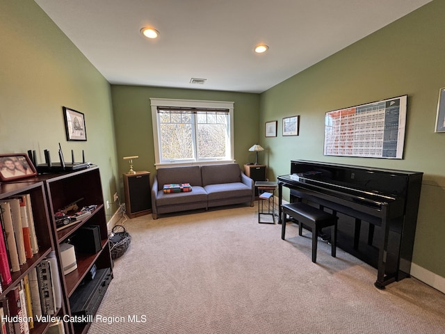 sitting room with recessed lighting, carpet flooring, visible vents, and baseboards