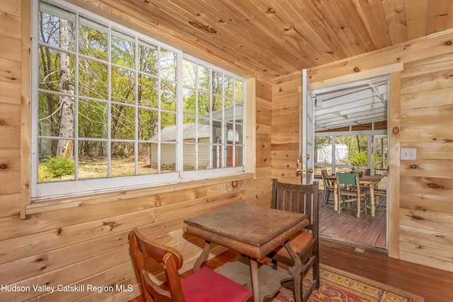 sunroom / solarium featuring a healthy amount of sunlight