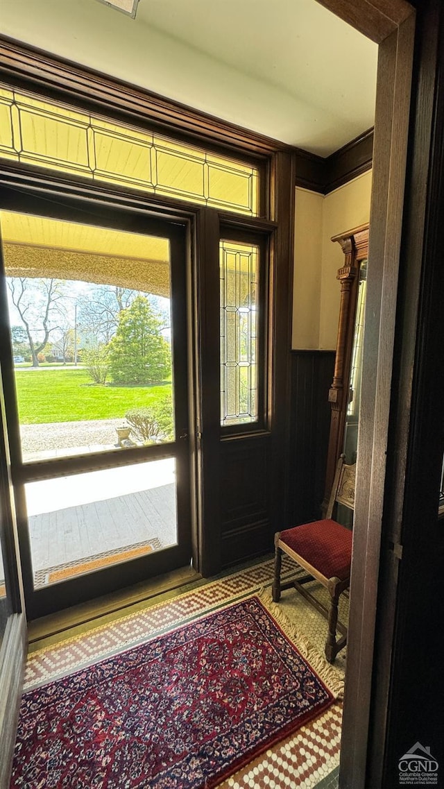 doorway to outside featuring plenty of natural light