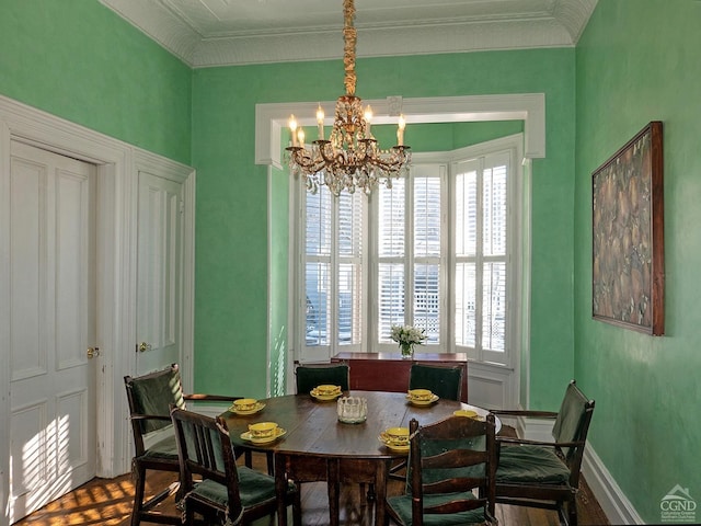 517-519 Washington St, Hudson, NY 12534 - dining room with a chandelier, healthy amount of natural light, ornamental molding, and baseboards