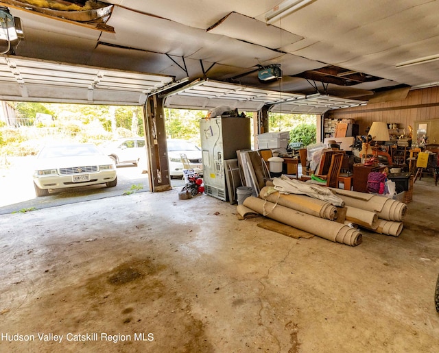 garage featuring a garage door opener