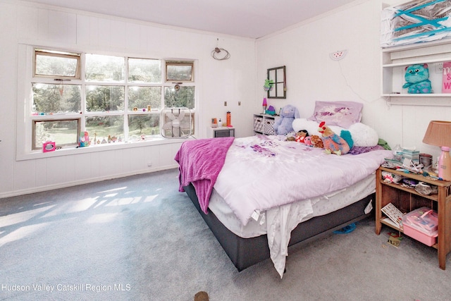 bedroom with carpet flooring and ornamental molding