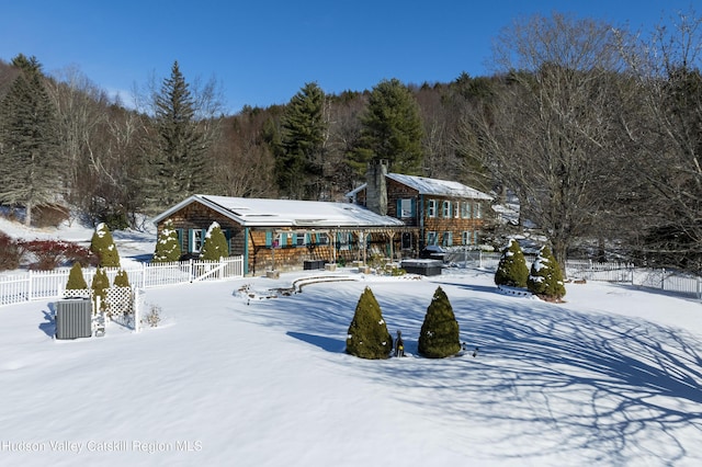 view of snow covered property