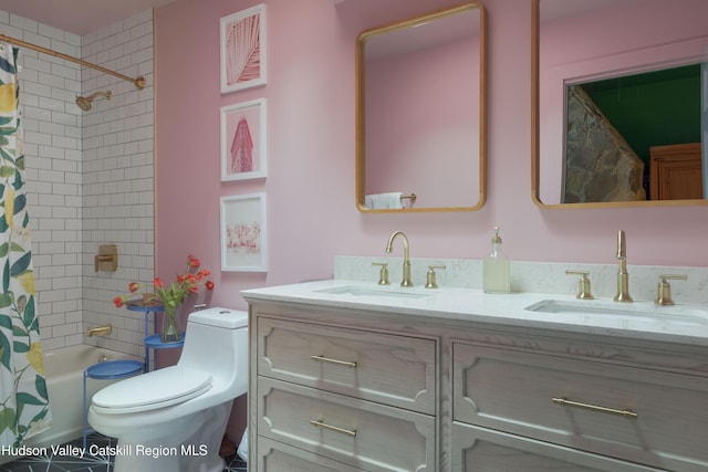 full bathroom with vanity, toilet, and shower / bath combo with shower curtain