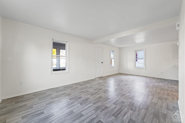 124 Cottage St, Ravena, NY 12143 - spare room featuring wood finished floors and baseboards