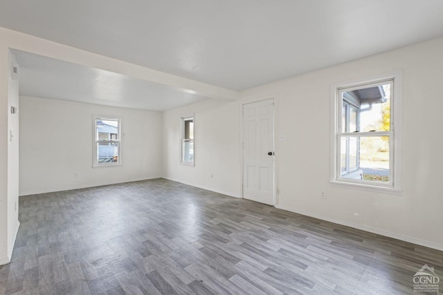124 Cottage St, Ravena, NY 12143 - spare room featuring wood finished floors and baseboards