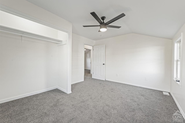 124 Cottage St, Ravena, NY 12143 - unfurnished bedroom with carpet floors, vaulted ceiling, baseboards, and ceiling fan