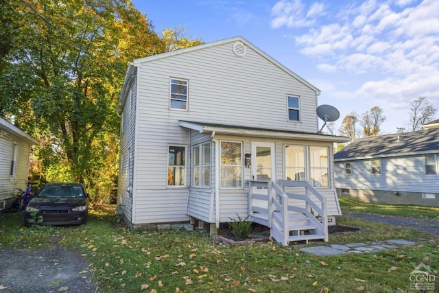 124 Cottage St, Ravena, NY 12143 - view of front facade with a sunroom