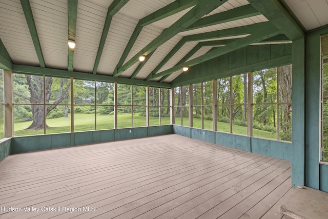 293 Pine Bush Rd, Stone Ridge, NY 12484 - unfurnished sunroom with vaulted ceiling and view of scattered trees