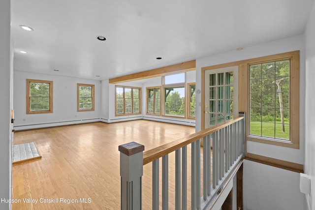 293 Pine Bush Rd, Stone Ridge, NY 12484 - empty room with recessed lighting, wood finished floors, and baseboard heating