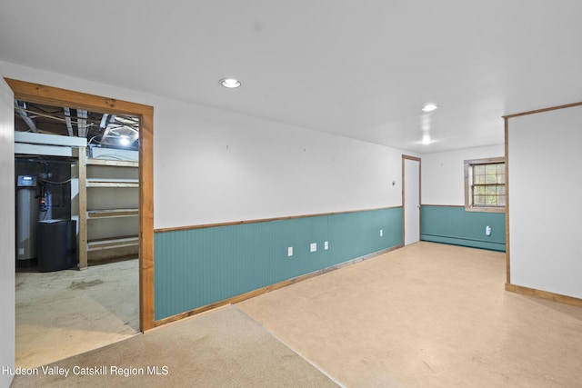293 Pine Bush Rd, Stone Ridge, NY 12484 - basement featuring a wainscoted wall, recessed lighting, a baseboard heating unit, and heating unit