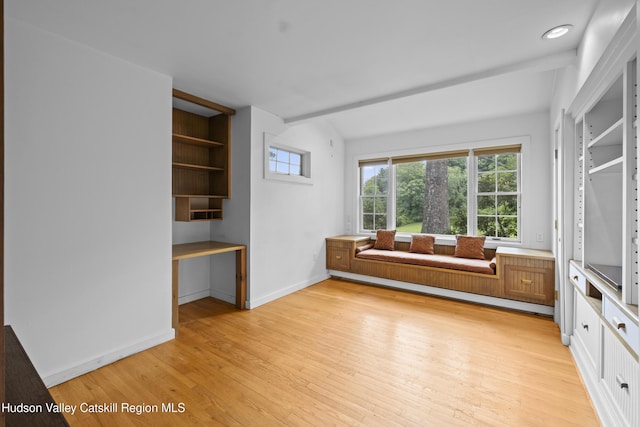 293 Pine Bush Rd, Stone Ridge, NY 12484 - sitting room with light wood finished floors, built in study area, and plenty of natural light