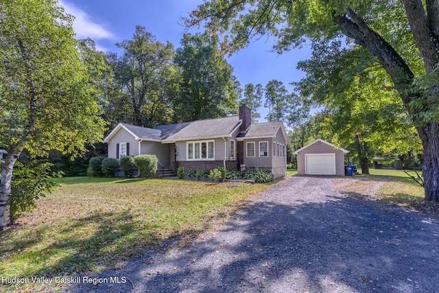 ranch-style house with a garage, driveway, a chimney, an outbuilding, and a front yard