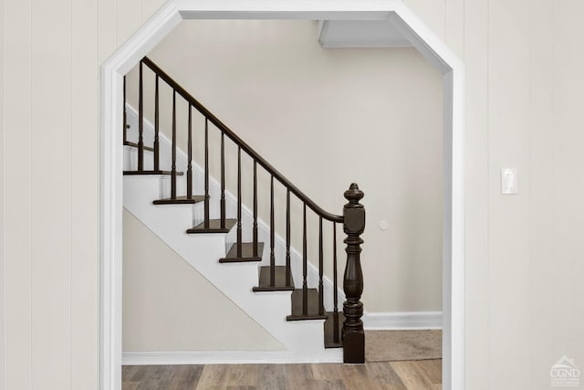 4 Lawrence Ave, Coxsackie, NY 12051 - stairs with wood finished floors, baseboards, and arched walkways