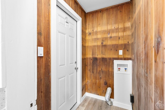 4 Lawrence Ave, Coxsackie, NY 12051 - clothes washing area featuring wooden walls, washer hookup, and light wood-type flooring