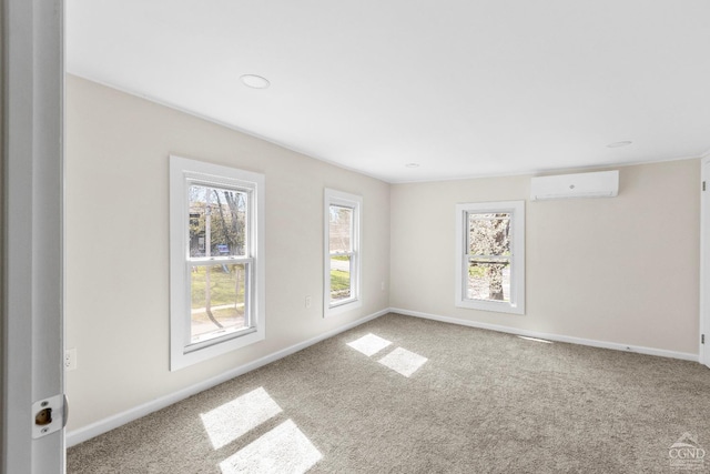 4 Lawrence Ave, Coxsackie, NY 12051 - carpeted empty room with an AC wall unit, healthy amount of natural light, and baseboards