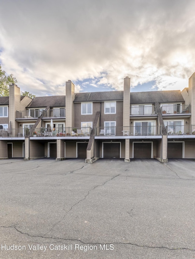 17 Riverview, Port Ewen, NY 12466 - view of property featuring community garages and a residential view