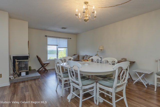 17 Riverview, Port Ewen, NY 12466 - dining room with wood finished floors, a chandelier, and baseboards