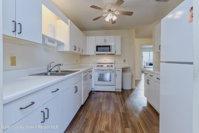 17 Riverview, Port Ewen, NY 12466 - kitchen featuring white appliances, a sink, dark wood finished floors, white cabinets, and ceiling fan