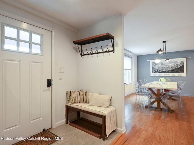 mudroom with light hardwood / wood-style flooring