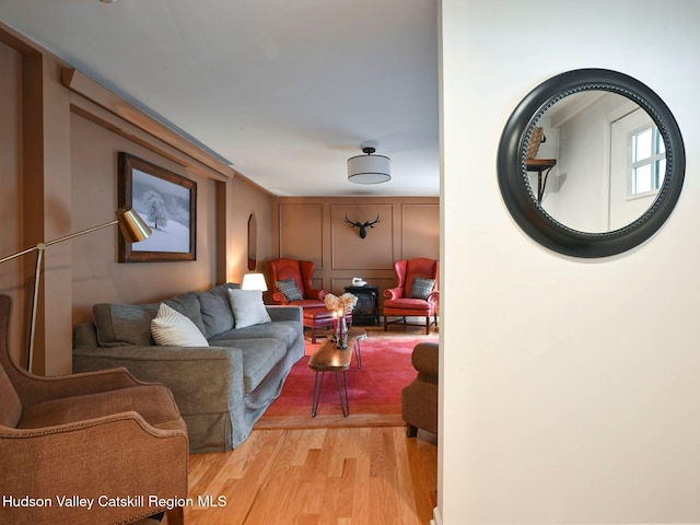 living room with light hardwood / wood-style flooring