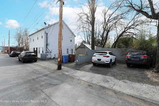 view of side of property with fence