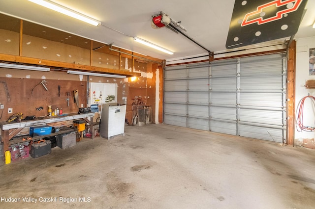 garage featuring a workshop area