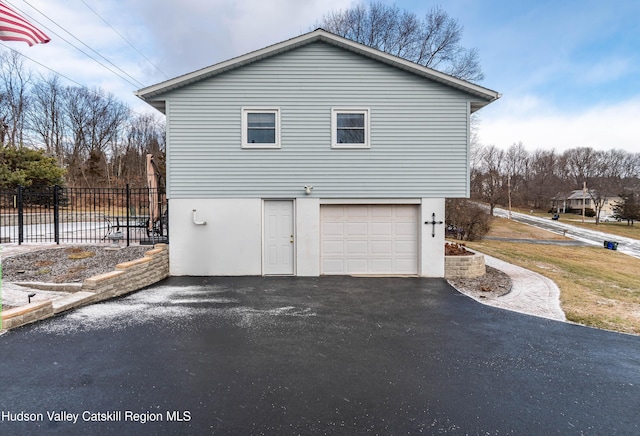 view of home's exterior with a garage