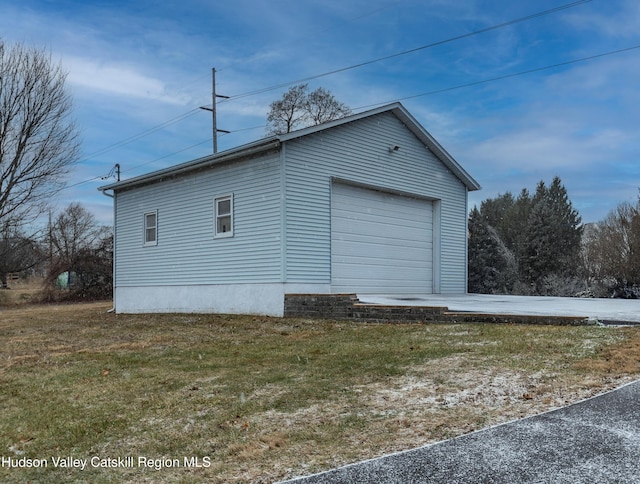 garage with a yard