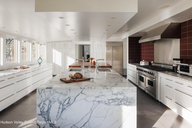 46 Pompeys Cave Rd, High Falls, NY 12440 - kitchen featuring high quality appliances, a sink, modern cabinets, tasteful backsplash, and recessed lighting