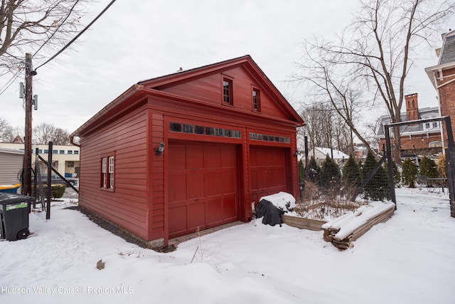 view of snow covered garage